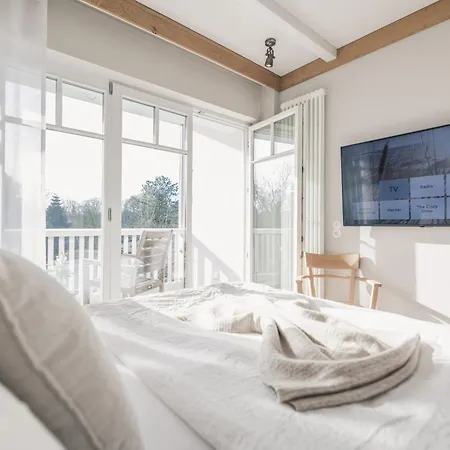 Отель The Cozy & Lofts Timmendorfer 4*